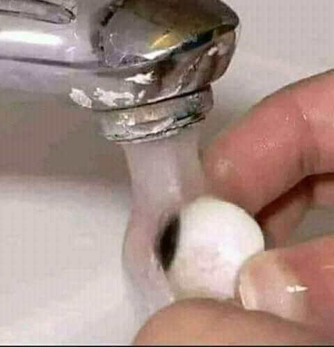 Washing eyes under tap water
