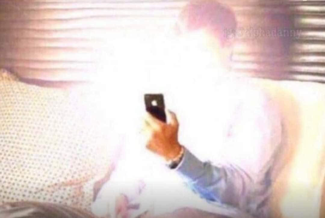 Man looking at a super bright phone meme