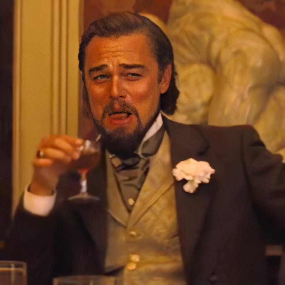 Leonardo DiCaprio drinking laughing meme