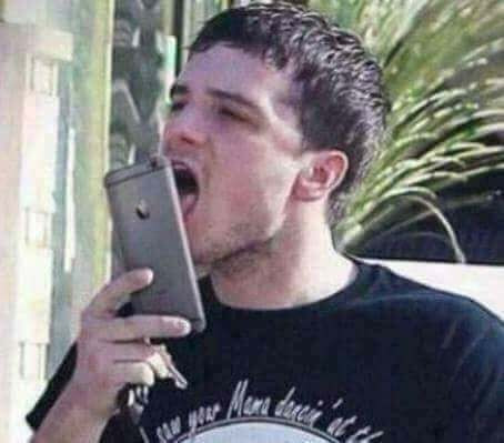 Man licking mobile phone meme