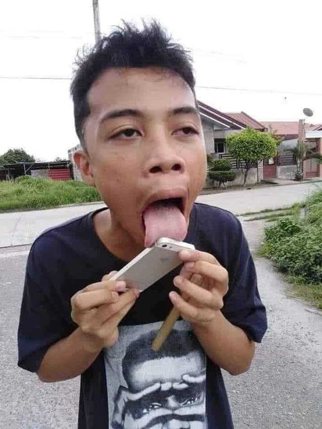 Boy licking iPhone screen mobile phone meme