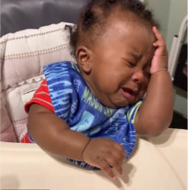 Black baby girl crying face palm meme