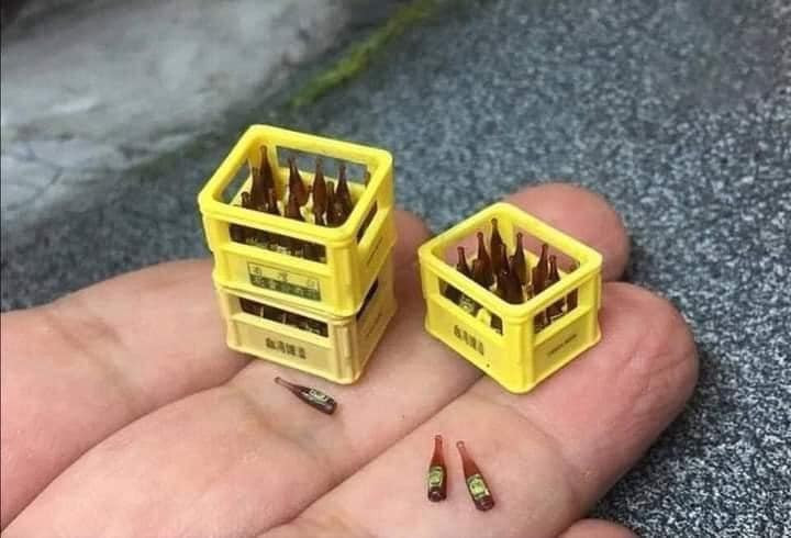 Tiny beer bottles in super small beer crates meme